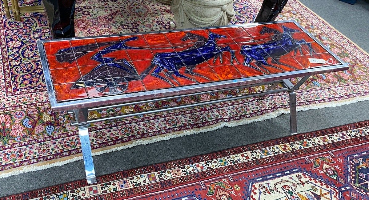 A mid century chromium coffee table, inset tiles by Andre Bayer, width 124cm, depth 45cm, height 43cm